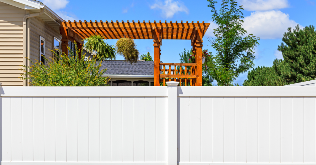 An image showing a well-maintained residential fence in a Phoenix backyard.