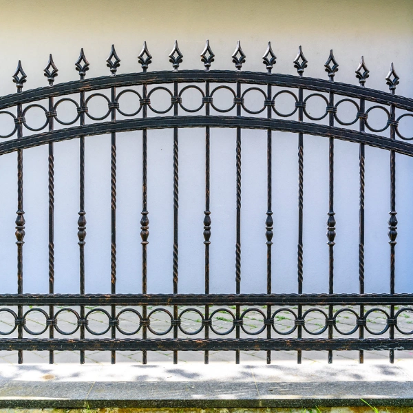 Image of a strong steel fence at a commercial property.