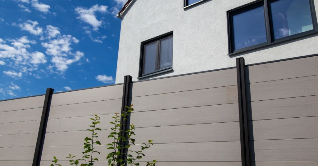 Image of modern fence complementing a desert home.