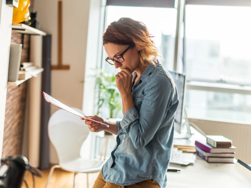 Image showing an Arizona homeowner reviewing zoning regulations.