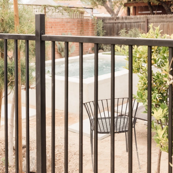 A pool fence showing 5-foot minimum barrier compliance and safety spacing rules.