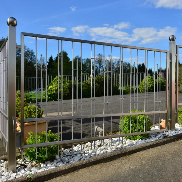 Powder-coated metal fence built to withstand Phoenix desert sun exposure.